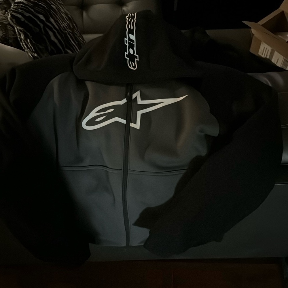 jacket/sweatshirt. detachable hood, back, elbow and shoulder pads. “tech air”